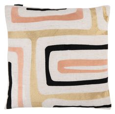 an orange, white and black pillow with square shapes on the front in various colors