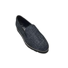 A leather slip-on shoes with a black wedge-like sole for comfort, created by Avah New York. A stylish look for everyday wear. This shoe has a silver rim design right above the rubber sole. Rim Design, Lightweight Sneakers, Leather Slip On Shoes, Black Wedge, Shoe Boutique, Leather Slip Ons, Slip On Sneakers, Loafers Men, Black Denim