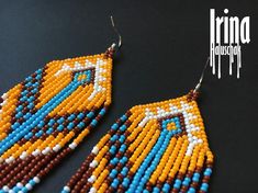 This listing sales only EARRINGS - scarf NOT included Native American style earrings Wide beaded earrings Tribal style seed bead earrings Long fringe earrings Dangle orange earrings Boho blue earrings Brown earrings White earrings  Materials: - czech glass beads Preciosa 10/0  Size: - leight - 4.3 inches (11 cm) - width - 1.6 inches (4 cm)  100% handmade. Seed Bead Earring, Bead Earring, Brown Earrings, Boho Blue, Orange Earrings, Long Fringe, Feather Jewelry, Beaded Collar, Indian Earrings