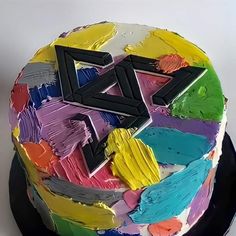 a multicolored cake with the letter z on it