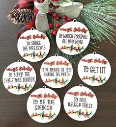 six christmas ornament sayings with pine cones and evergreen branches in the background