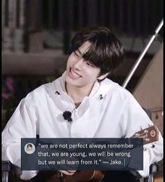 a person sitting down with a guitar in front of him and the caption that says, we are not perfect always remember that, we are young, we will be wrong