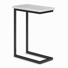 a black and white side table with a marble top on an isolated white background,