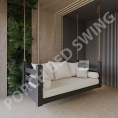 a white and black swing bed in a living room