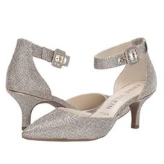 Anne Klein Women's Fabulist Textured Pointed Toe Ankle Strap Heels / Pumps. Colorway Is Platinum (Silver And Gold Mixed). Women's Size 8. Condition: New In Box; Box Has Wear. New To Poshmark? Sign Up Using Invite Code: Tentoday For $10 Off Your Purchase! - Anne Klein Iflex Technology Allows For A Flexible Fit That Can Bend Up To 90 Degrees. - The Anne Klein Fabulist Pump Will Showcase Your Fabulous Style With A Two-Piece Silhouette And A Pointed Toe. - Leather, Fabric, Or Synthetic Uppers. - Adj Metallic Silver Heels With Ankle And Heel Straps, Silver Round Toe Kitten Heels For Party, Silver Pointed Toe Kitten Heels For Party, Metallic Silver Heels With Ankle Strap, Fall Party Kitten Heels With Almond Toe, Silver Closed Toe Kitten Heels For Formal Occasions, Metallic Fitted Heels With Ankle Strap, Silver Kitten Heels With Heel Strap For Party, Chic Metallic Silver Heels With Heel Strap