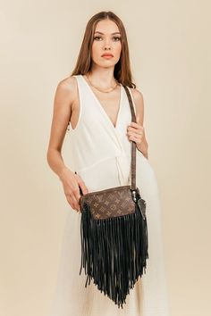 Compact shoulder bag, versatile and cleverly designed perfect for your essentials. The Amalfi is an ideal go-everywhere bag that is lightweight and roomy yet emanates effortless Boho-chic. Dimensions: Width: 9"x Height: 5" Depth: 1.75" Fringe Length: 12.5" Strap Length: 47" *** Shorter fringe option (9") available at no extra cost *** Guarantee Of Authenticity We put every bag through a multi-point, brand-specific authentication process by our team of luxury experts. Our reputation is on the lin Versatile Clutch Bag With Dust Bag, Everyday Shoulder Flap Bag With Dust Bag, On-the-go Crossbody Satchel With Dust Bag, Daily Use Clutch Shoulder Bag With Dust Bag, Versatile Crossbody Bag With Dust Bag, Short Fringe, Boho Bags, Amalfi, Vintage Boho