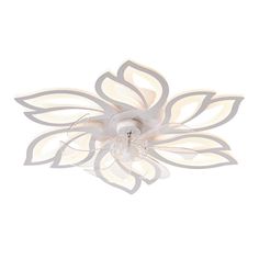 a white ceiling light with a flower design on it