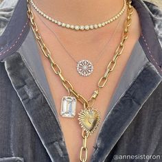 Our Heart of Gold charm is one of Anne’s favorites. She wears it daily, clipped onto our Luxe Lillian chain link necklace. The heart charm can also be clipped onto a pearl necklace for a more festive look. This versatile piece has a secure clip-on diamond bail designed for effortless wearability. Heart Charm measures 30mm in height and 29.5mm in width. Diamond Clip on Bail opens and can be clipped onto any chain. We worked really hard to design a clasp that is secure. Please make sure you hear t Diamond Necklace With Box Chain For Gift, Yellow Gold Diamond Necklace With Box Chain, Elegant Chain Necklace With Heart Charm And Link Shape, Elegant Link Chain Necklace With Heart Charm, Luxury Heart-shaped Charm Necklaces, Elegant Link Necklace With Heart Charm, Elegant Jewelry With Heart Pendant And Paperclip Chain, Elegant Heart Pendant Jewelry With Paperclip Chain, Luxury Charm Necklace With Cable Chain