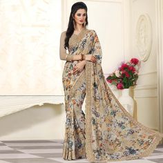 You look so charming wearing this attire. Style and trend will be at the peak of your beauty when you attire this adorable light brown colored saree. This saree is made from georgette fabric which is highlighted with beautiful floral print work & kalamkari border. This saree is paired with unstitched georgette blouse piece which can be stitched as per your requirement. this saree is comfortable to wear and care. You can wear this saree for parties, outings, regular social meets and other homely Reception Sarees, Latest Sarees Online, Floral Print Sarees, Latest Indian Saree, Indian Designer Sarees, Latest Designer Sarees, Indian Sarees Online, Utsav Fashion, Lehenga Saree