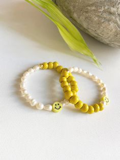 Freshwater Pearl Stretch Bracelet Yellow Smile Face Bracelet | Etsy White Round Jewelry For Friendship, Trendy Round Bead Jewelry For Mother's Day, Heart Shaped Letter Beads Jewelry For Friendship, Trendy Yellow Jewelry With Letter Beads, Dainty Jewelry With Heart Shaped Round Beads, Dainty Jewelry With Round Heart Beads, Dainty Jewelry With Letter Beads For Friendship, Handmade Trendy Friendship Jewelry, Dainty Jewelry With Heart-shaped Beads