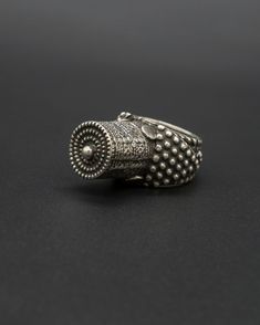 This vintage silver Yemini ring is meticulously hand-textured and oxidized to perfection. Every detail has been expertly crafted to achieve a bold and daring look. Embrace the artistry of this ring. This item will ship directly from Bali via DHL delivery. Please allow up to 15 business days to arrive.