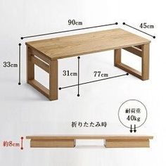 a wooden coffee table with measurements for the top and bottom, along with an additional shelf