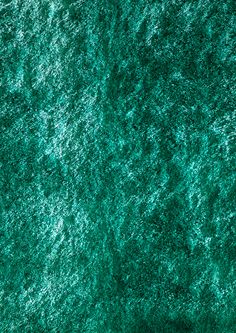 an image of a green carpet that looks like it has been dyed with the colors of emerald