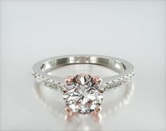 an engagement ring with diamonds on the side