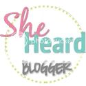 the logo for she heard bigger