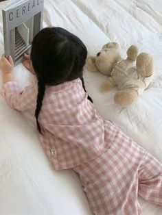 Sweet dreams and stylish nights await! Our pink gingham pajamas make your little girl's bedtime a fashionable affair with its gorgeous pattern. Finished with lace trim details for extra charm. Extra soft fabric and relaxed fit offer superior comfort. She can nap and play easily without feeling restricted. No bunching, itching, or stuffiness! Sophisticated details add a dash of chic fashion to her loungewear looks, keeping her stylish from playtime to naptime. Perfect for lazy lounge days, bedtime, slumber parties, photoshoots, and more Pink gingham pajamas with white lace trim details Available in sizes 3T-11Y Plaid Cotton Sleepwear For Sleepover, Cotton Gingham Loungewear Sets, Gingham Cotton Loungewear Sets, Plaid Cotton Sleepwear For Bedtime, Cotton Plaid Sleepwear For Bedtime, Plaid Cotton Sleepwear Sets, Plaid Cotton Sleep Sets, Plaid Cotton Sleepwear, Plaid Cotton Sleepover Sets