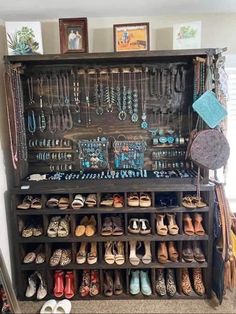 a shoe rack filled with lots of jewelry