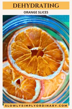 an orange sliced in half with text overlay that reads how to dehydraate orange slices