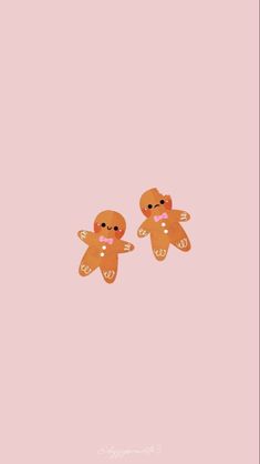 two small brown teddy bears on pink background