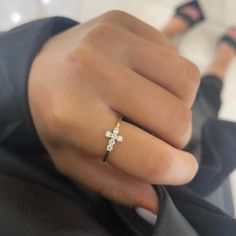 Our Little Grace Diamond Cross Ring is a twinkling token of faith. The intentional delicacy of this design makes for the heartfelt gift of a child's first piece of fine jewelry or an adult's everyday dainty wear. Metal: 18k White Gold / 18k Yellow Gold / 18k Rose Gold 6 Round Brilliant Cut Natural Diamonds: Approx. 0.24 ctw G/H Color and SI1-2 Clarity Diamonds Vvs Clarity Diamond Stackable Rings Gift, 14k Gold Stackable Rings With Vvs Clarity For Gift, Diamond Cross Ring For Gift, Diamond Cross Rings For Gifts, Cross-shaped Diamond Ring For Gift, 14k Yellow Gold Cross Rings, Dainty Stackable Rings With Brilliant Cut As Gift, Gold Diamond Cross Ring, Dainty Hallmarked Yellow Gold Diamond Ring