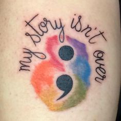 a tattoo with the words, you're just here and two dots on it