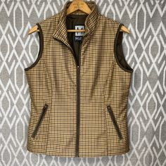 Vintage Miller Vest Brown & Tan Houndstooth Print Skiwear Insulated Vest Size: Medium Excellent Like New Condition. No Damage To Note. No Evidence Of Wear. Dresses Up Any Outfit. Classy With A Tee And Your Favorite Pair Of Jeans. Great For Aprs-Ski In A Classic & Timeless Look. Amazing Contoured Fit To Snatch & Smooth While Staying Warm Without Warm With The Bulk. From The Private Skiwear Collection Of @Klizzyb’s Mom Who Never Actually Participated In The Sport. But She Dressed Like She Did! Miller Has Been A High End Designer Brand In The World Of Winter Sports For A Long Time. Material: 100% Polyester Approximate Measurements: Pit To Pit: 20” Length: 24” Please Closely E Outfit Classy, Ski Wear, Winter Sports, Vintage Jacket, Timeless Classic, Stay Warm, Vintage Ladies, Jackets & Coats, Jackets For Women