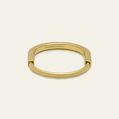 This Tiffany & Co. Lock Bangle is a bold and visual statement about the personal bonds that make us who we are. Designed to be worn by all genders, the Tiffany Lock bangle features an innovative clasp that echoes the functionality of a padlock, an important motif from The Tiffany Archives. This style is expertly crafted in 18k yellow gold. Material- 18k Yellow Gold Size- Large, fits wrists up to 6.75" White Gold Diamond Bracelet, Stackable Jewelry, Stackable Bracelets, Fine Jewelry Bracelets, Watch Necklace, Tiffany & Co., Ring Bracelet, White Gold Diamonds, Earring Necklace