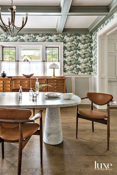 the dining room is clean and ready for guests to use it as an entertaining space