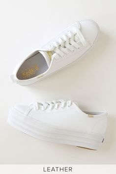 Lace into a look you love with the Keds Triple Up White Leather Platform Sneakers! These irresistibly cute sneakers have a classic lace-up design, a rounded toe upper, white hardware, and a bold 1.75" platform sole. Pair with distressed denim and you a plain white tee for a full look! Gold embroidered logo tag at the outstep and tongue. Fit: This garment fits true to size. 1. 75" platform rubber heel. Cushioned insole. Rubber sole has nonskid markings. Genuine leather upper. Balance man made mat White Platform Sneakers For Everyday, Everyday Lace-up Sneakers With White Laces, White Leather Platform Sneakers With White Laces, Everyday Lace-up Platform Sneakers With Gum Sole, Classic White Lace-up Platform Sneakers, White Platform Sneakers With Gum Sole For Spring, Everyday Lace-up Platform Sneakers With White Sole, Classic Sneakers With White Sole And Laces, Leather Sneakers With White Laces For Spring