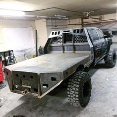 a large truck is parked in a garage