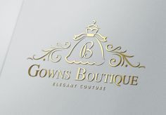 the logo for gown boutique is gold and white with a crown on it's head