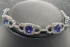 Formal Tanzanite Fine Jewelry Bracelets, Formal Tanzanite Bracelets Fine Jewelry, Elegant Tanzanite Bracelets For Formal Occasions, Formal Tanzanite Round Bracelets, Round Tanzanite Bracelets For Formal Occasions, Blue Tanzanite, Box Clasp, Solitaire Pendant, Cushion Cut