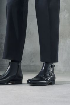 The Jagger is a bold triple monk strap ankle boot. A modern triple buckle closure is accompanied by a sleek, elongated plain toe design creating a perfect balance of elegance and simplicity. The leather sole features a rubber island for improved traction and durability.