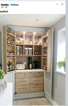 an image of a kitchen pantry with lots of food in the cupboards and drawers