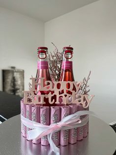 a birthday cake made to look like soda bottles