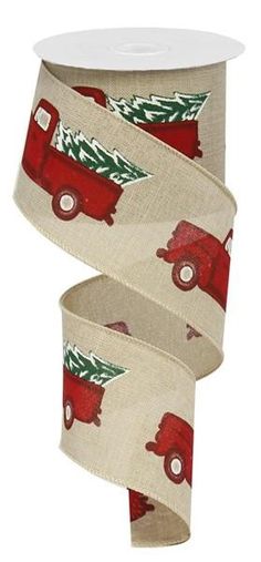 a roll of christmas ribbon with red truck and tree on the front, white background