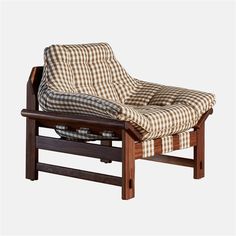 a chair that is sitting on top of a wooden frame and has a plaid seat cushion