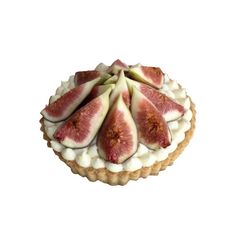 a tart topped with sliced figs on top of white frosted icing