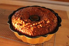 a bundt cake sitting on top of a cooling rack