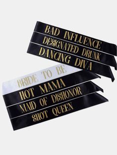 three black and gold sashs with white lettering on the front one says,'bad influence designated drink dancing diva '