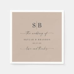 a wedding napkin with the word sb on it in black ink, and an elegant monogram