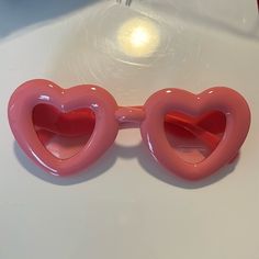 Pink Heart Sunglasses Never Worn With Dust Bag Heart-shaped Sunglasses For Valentine's Day, Heart-shaped Glass Sunglasses As Gift, Heart-shaped Glass Sunglasses For Gift, Heart-shaped Sunglasses For Valentine's Day Gift, Trendy Heart-shaped Glass Sunglasses, Pink Heart-shaped Sunglasses As Gift, Heart-shaped Pink Sunglasses As Gift, Heart-shaped Pink Sunglasses For Gift, Pink Heart Sunglasses