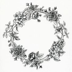 a black and white drawing of a wreath with roses