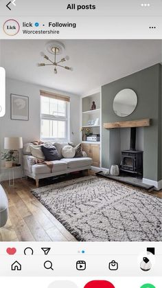 a living room filled with furniture and a fire place