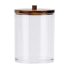 a glass jar with a wooden lid