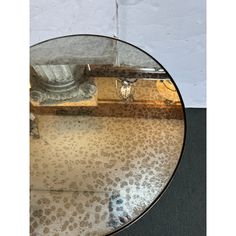 a round glass table with an animal print pattern on it