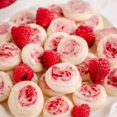 raspberry rolls with cream cheese frosting and fresh raspberries