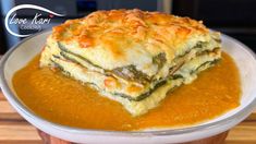 some kind of lasagna in a bowl on a table