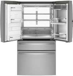 an open refrigerator with its door wide open and it's light on, showing the interior