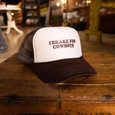 These trucker hats from Rodeo Hippie are made and printed in Texas. They print small batch goods inspired by old country and all things retro and western. Grab one to go with your Montana tees and tanks! Western Trucker Hats, Foam Hats, Cowboy Candy, Custom Cowboy Hats, Funny Trucker Hat, Hat Shelf, Hat Bar, Pretty Clothing, Western Vibes